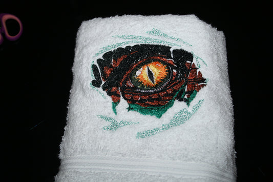 Serviette de bain œil dinosaure